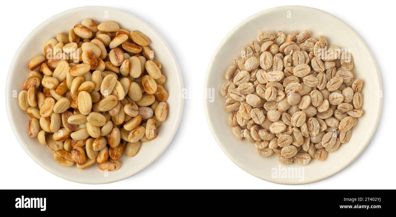 dried coffee beans with or without hull or parchment skin on white plates, coffea arabica, pulp and skin or flesh or the coffee cherry is removed Stock Photo