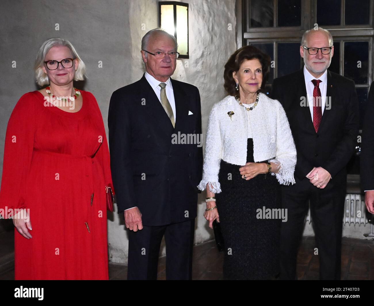 UPPSALA, SWEDEN 20231027From left, Cecilia Hjorth Attefall, King Carl Gustaf, Queen Silvia, Stefan Attefall, Governor of Uppsala County arrive at Upps Stock Photo
