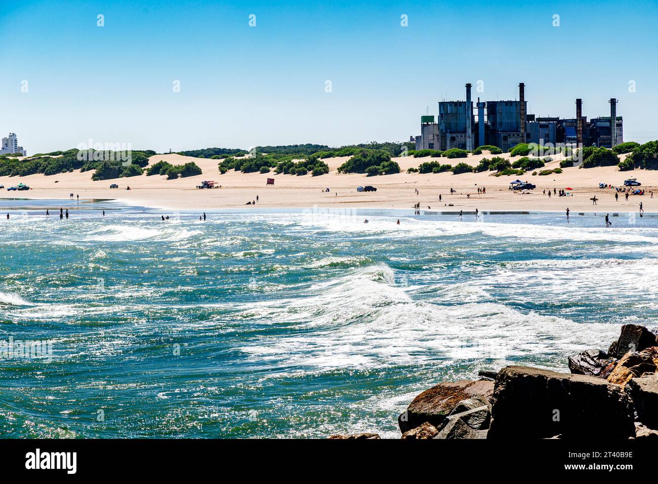 Necochea city, Buenos Aires, Argentina. View of the town skyline and the beach from the harbor pier. Stock Photo