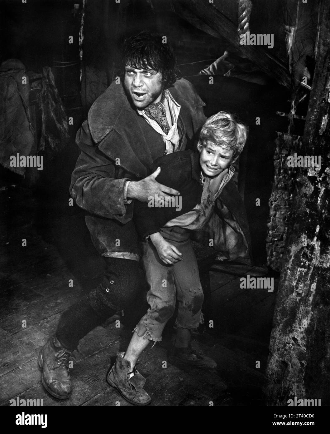 Oliver Reed, Mark Lester, on-set of the British musical film, 'Oliver!', Columbia Pictures, 1968 Stock Photo