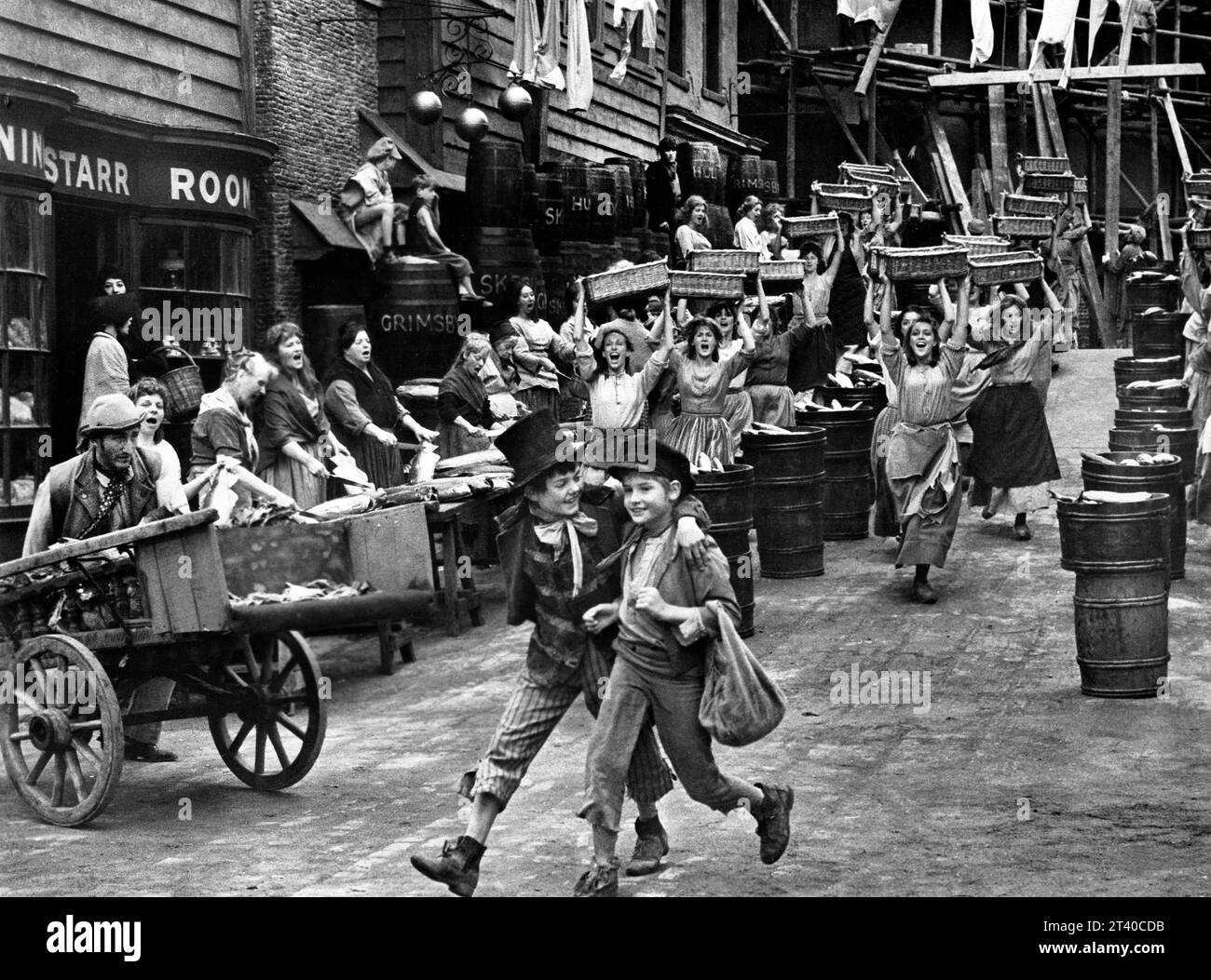 Jack Wild, Mark Lester (both foreground center), on-set of the British musical film, 'Oliver!', Columbia Pictures, 1968 Stock Photo