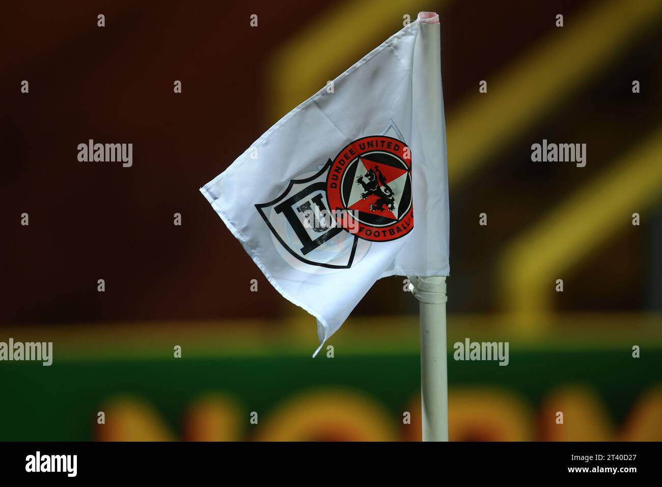 Dens Park, Dundee, UK. 24th Oct, 2023. Scottish Premiership Football, Dundee versus Ross County; A corner flag showing the original and modern Dundee United crests as United celebrate 100 years since their name change from Dundee Hibernian Credit: Action Plus Sports/Alamy Live News Stock Photo