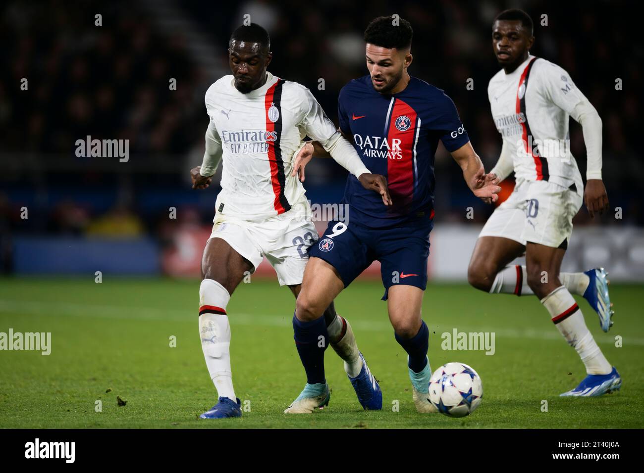 Goncalo Ramos of Paris Saint-Germain FC competes for the ball with Fikayo Tomori and Pierre Kalulu of AC Milan during the UEFA Champions League football match between Paris Saint-Germain FC and AC Milan. Stock Photo