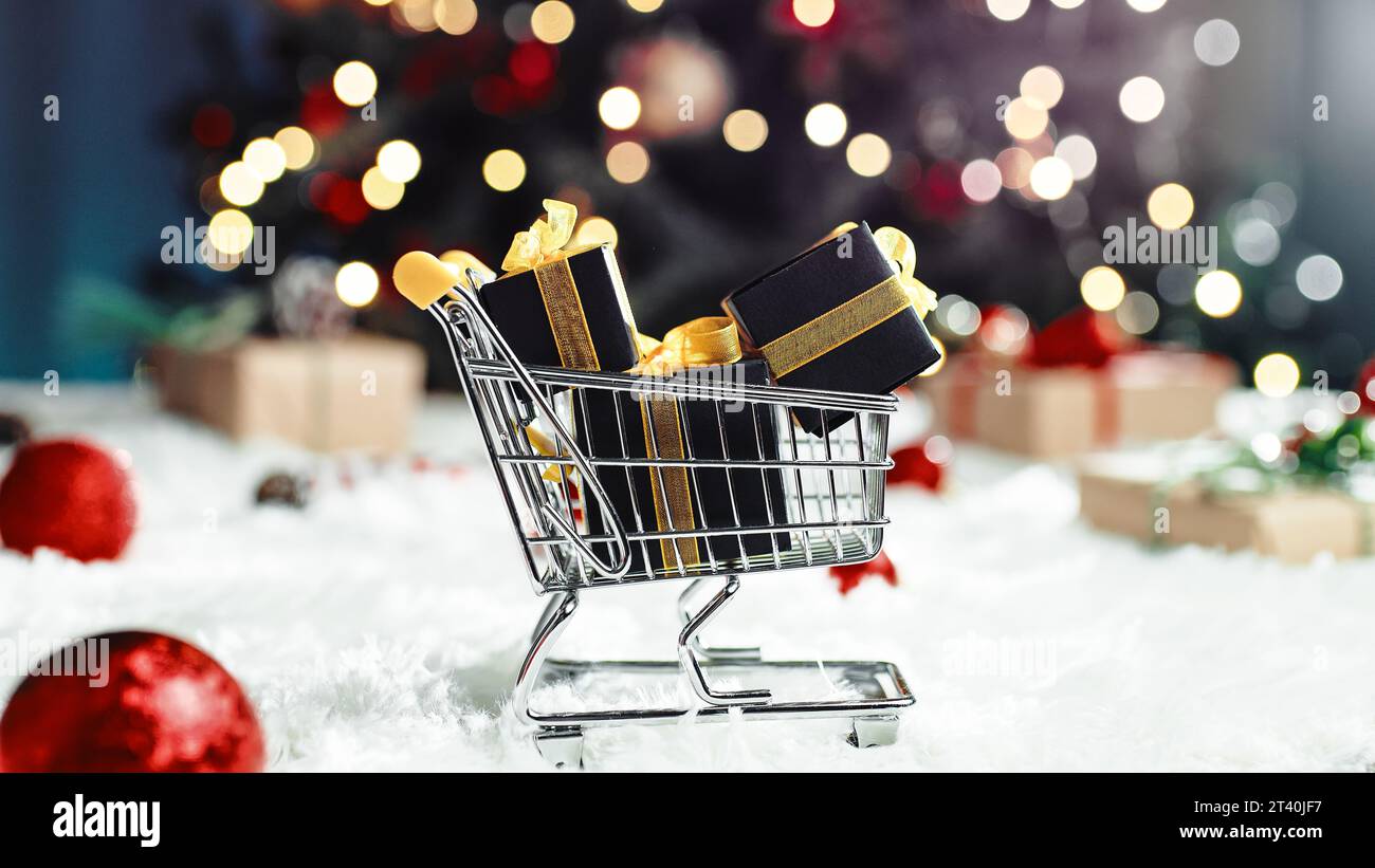 Shopping cart with Christmas gifts box Stock Photo