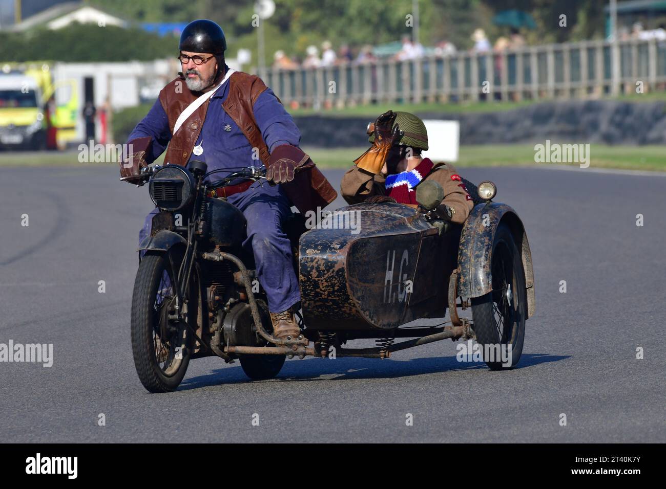 1943 Royal Enfield Motorcyle and sidecar combination, Track Parade - Motorcycle Celebration, circa 200 bikes featured in the morning parade laps, incl Stock Photo