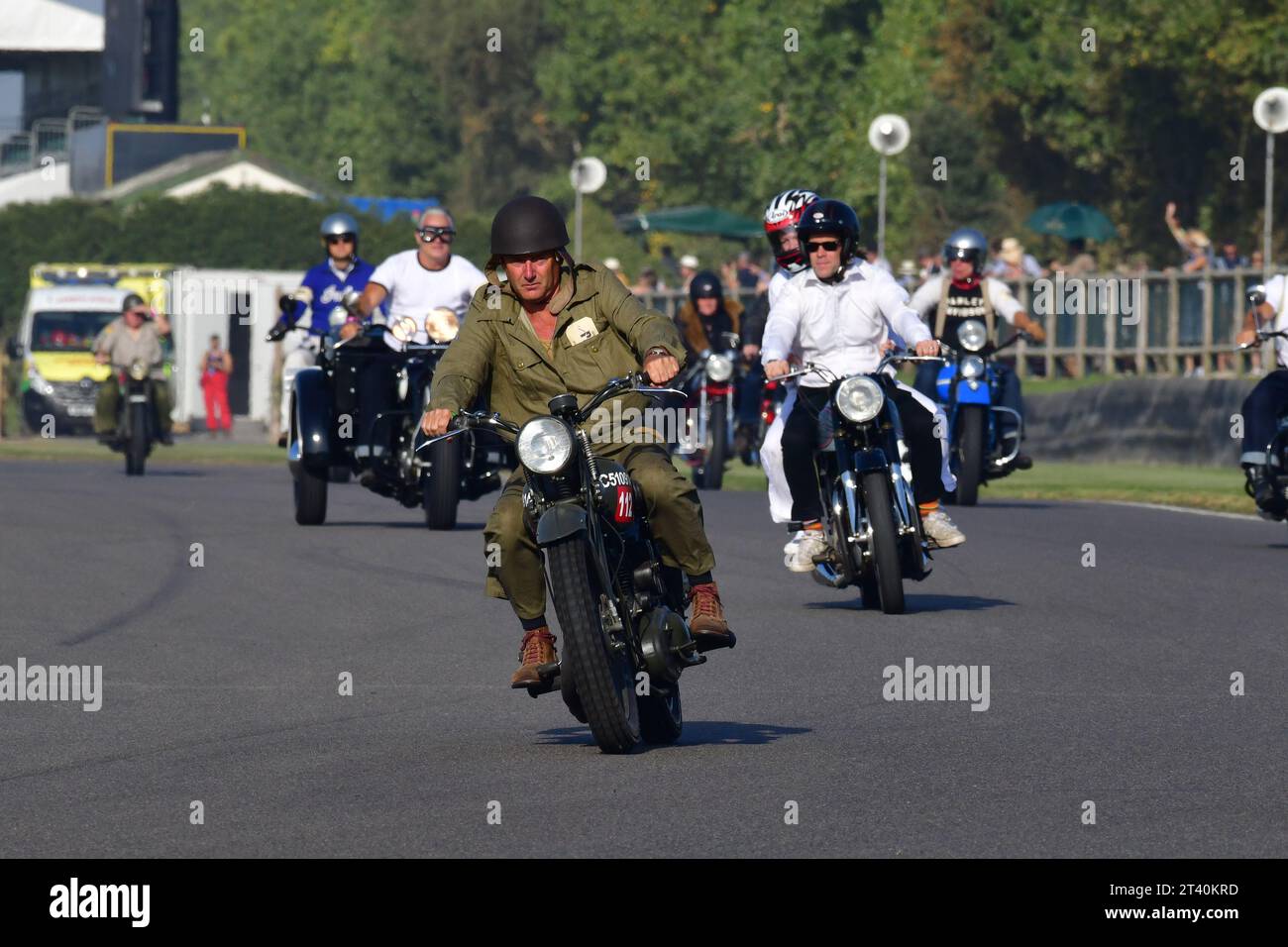 ex-Military motorcycle, Track Parade - Motorcycle Celebration, circa 200 bikes featured in the morning parade laps, including sidecar outfits and moto Stock Photo