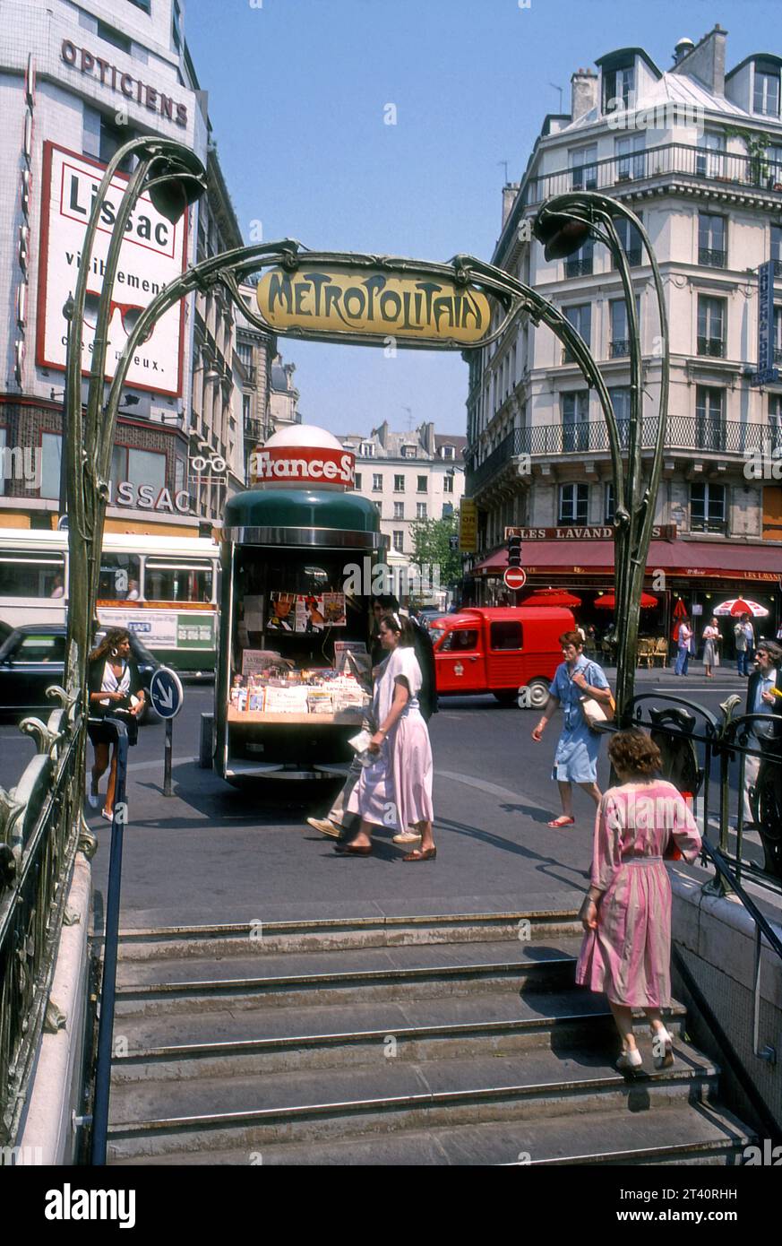 Street scene with Metropolitain sign at entrance in Paris, France, Europe Stock Photo