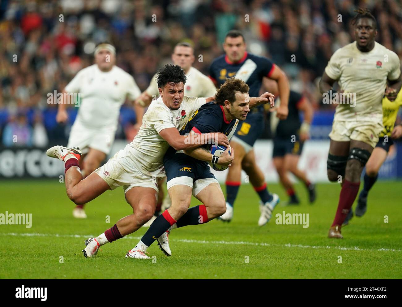 England's Marcus Smith (left) catches Argentina's Nicolas Sanchez during the Rugby World Cup 2023 bronze final match at the Stade de France in Paris, France. Picture date: Friday October 27, 2023. Stock Photo