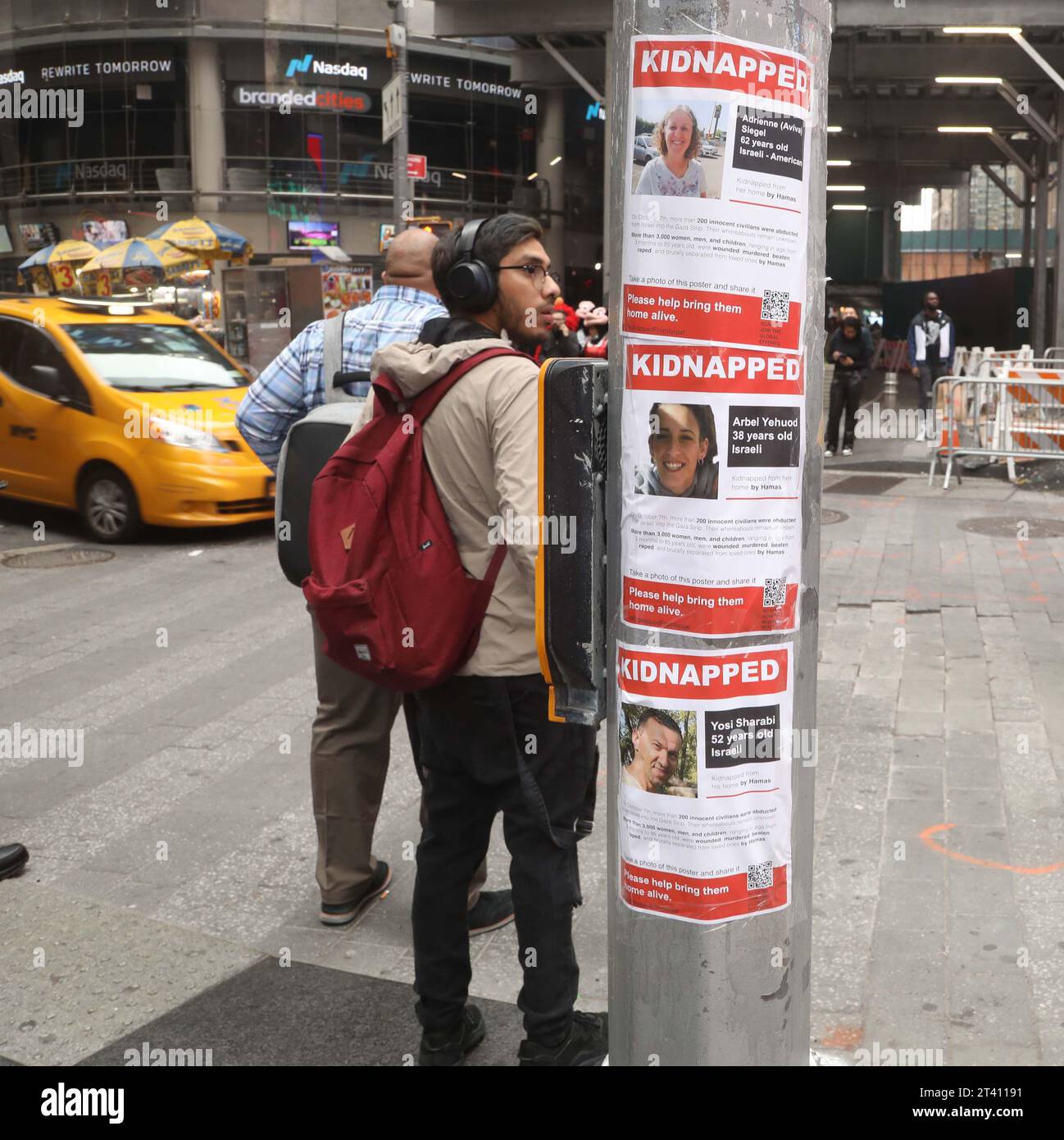 New York, New York, USA. 27th Oct, 2023. A view of the ''˜Kidnapped' posters of 62 year old Israeli- American hostage Adrienne Seigel, 38 year old Israeli hostage Arbel Yehiod and 52 year old Israeli hostage Yosi Sharabi in Times Square. The signs were created by Israeli street artists nom de plume Dede Bandaid and Nitzan Mintz as a campaign to raise awareness for the over 200 hostages Hamas captured on October 7th. Concerns about the safety of the hostages has increased as the IDF ground operation in Gaza is expanding. (Credit Image: © Nancy Kaszerman/ZUMA Press Wire) EDITORIAL USAGE ONLY Stock Photo