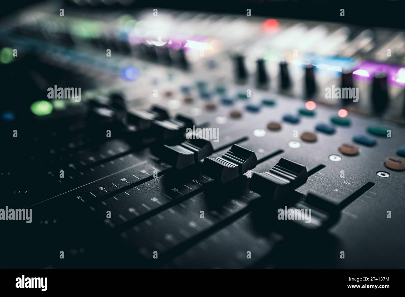 Sound control music mixer in record studio. Close up mixer and equalizer volume on the mixer