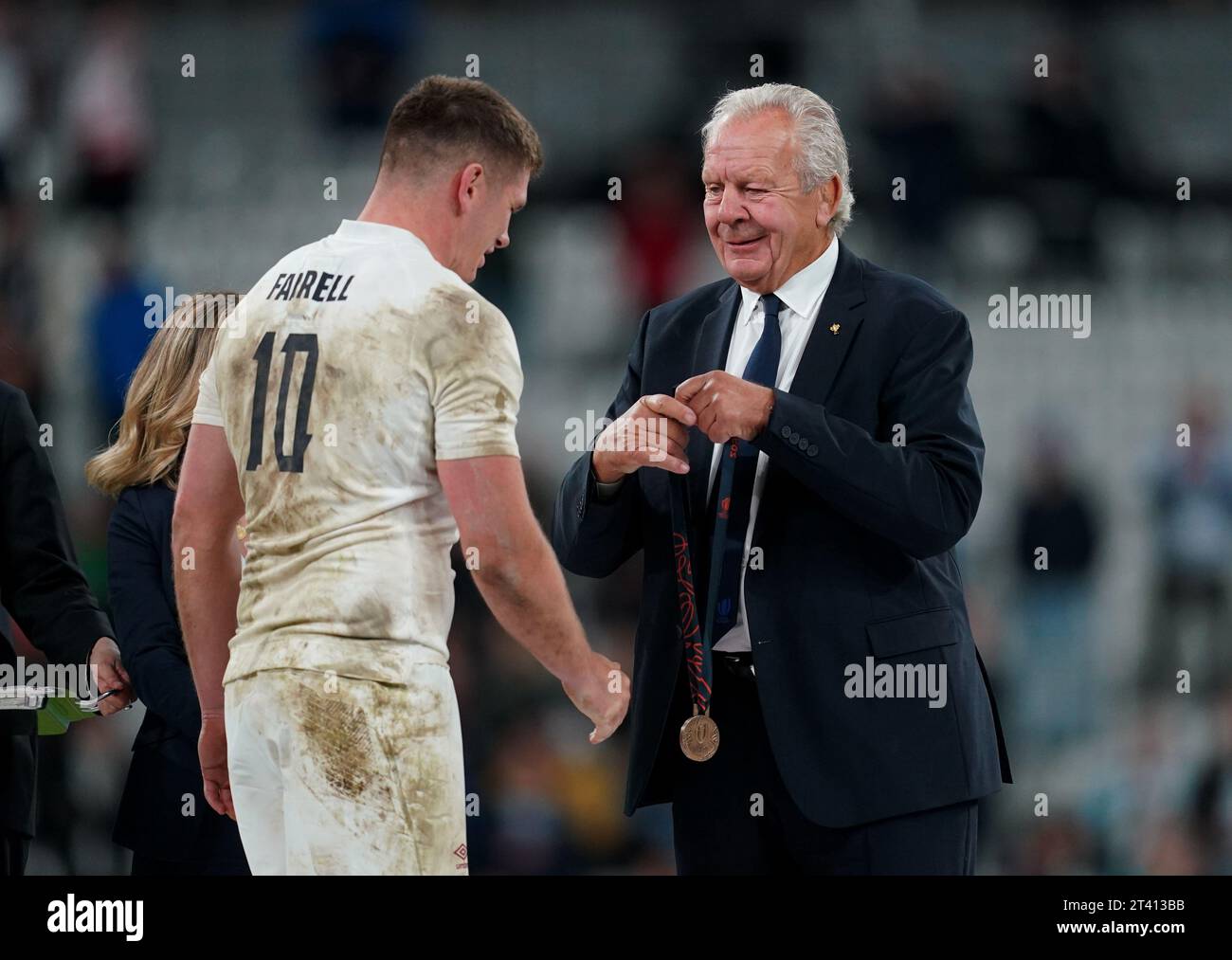 England's Owen Farrell receives his bronze medal from World Rugby ...