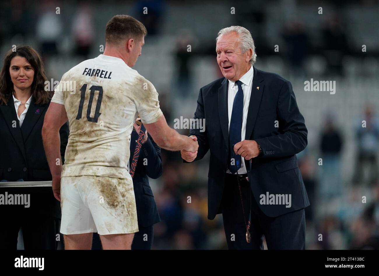 England's Owen Farrell receives his bronze medal from World Rugby ...