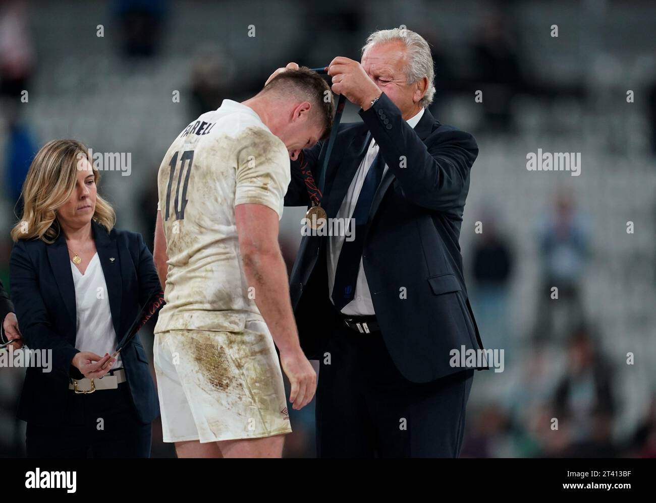 England's Owen Farrell receives his bronze medal from World Rugby ...