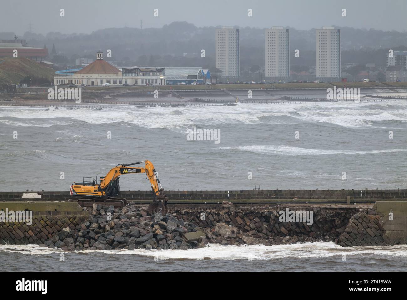 Aberdeen Harbour, Aberdeen City, UK. 27th Oct, 2023. This is the exterior Pier extending into the Sea from Aberdeen Harbour which has sustained severe damage due to Storm Babet. Emergency repairs are being implemented until a full assessment of the damage can be conducted. Credit: JASPERIMAGE/Alamy Live News Stock Photo