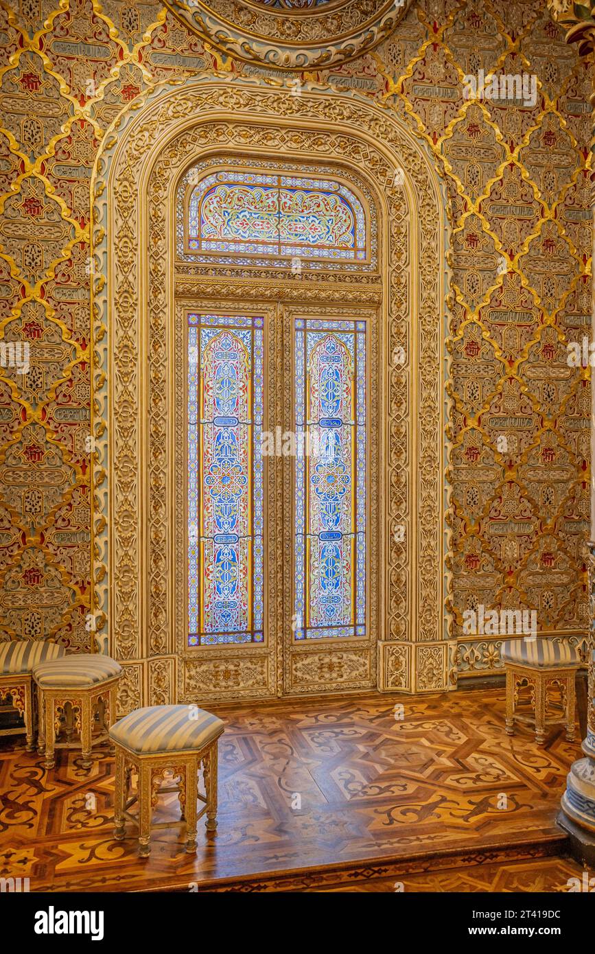 Stained glass window in the moorish revival style Arab Room in the Bolsa Palace, Porto, Portugal on 14 October 2023 Stock Photo