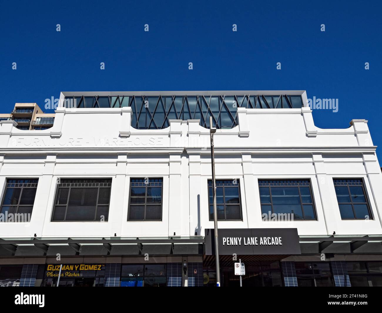 Melbourne Australia /  Penny Lane Arcade retail and prestige Penny Lane Apartments located in Puckle Street; Moonee Ponds.The Melbourne Cafe and Resta Stock Photo