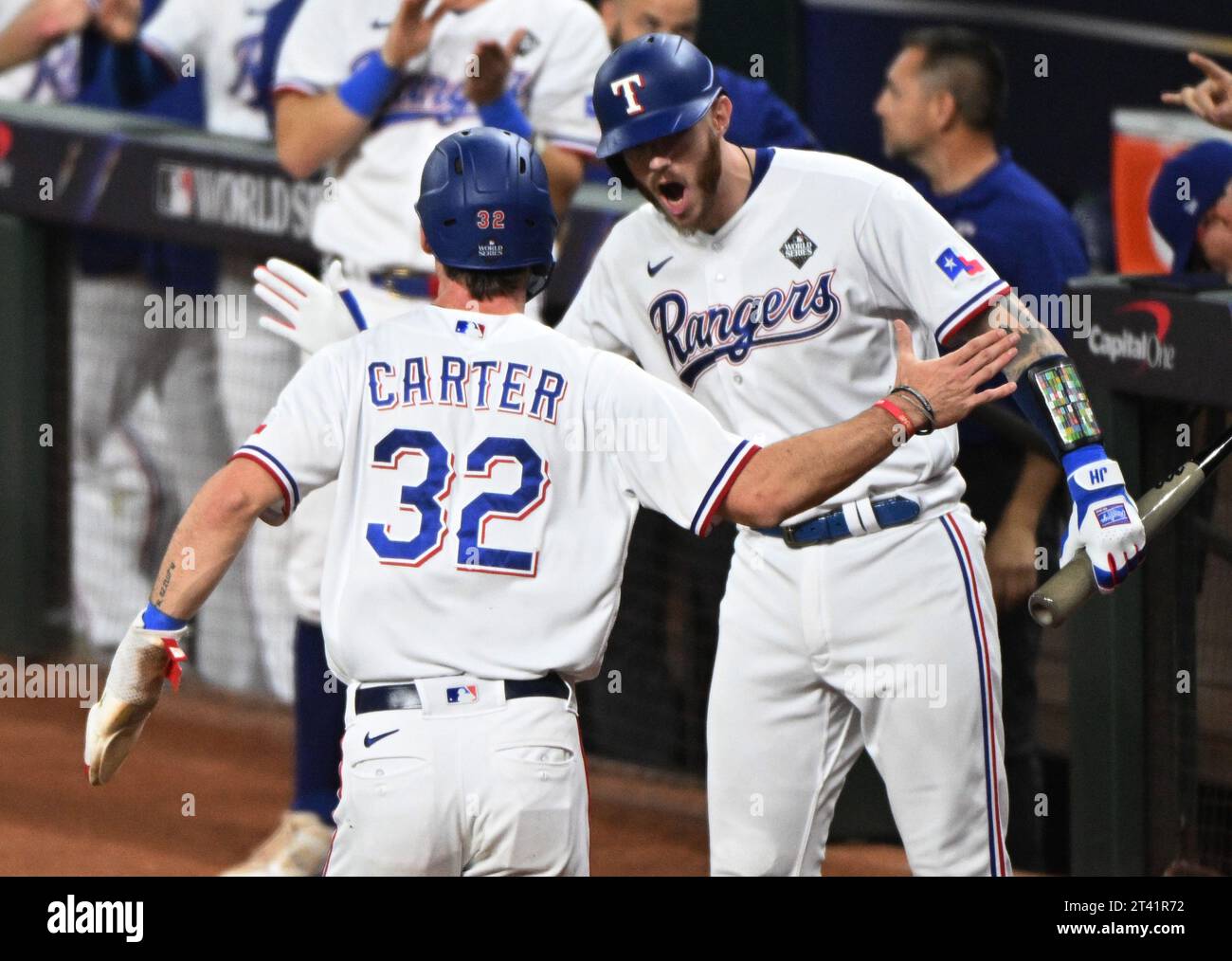 Arlington, United States. 27th Oct, 2023. Texas Rangers Evan Carter is congratulated by catcher Jonah Heim after scoring on a single by Adolis Garia in the first inning against the Arizona Diamondbacks in game one of the 2023 World Series at Globe Life Field in Arlington, Texas on Friday, October 27, 2023. Photo by Ian Halperin/UPI Credit: UPI/Alamy Live News Stock Photo