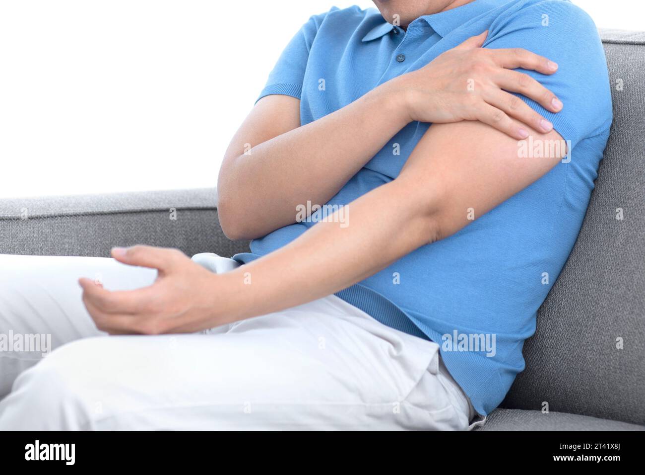 Man with arm pain Stock Photo