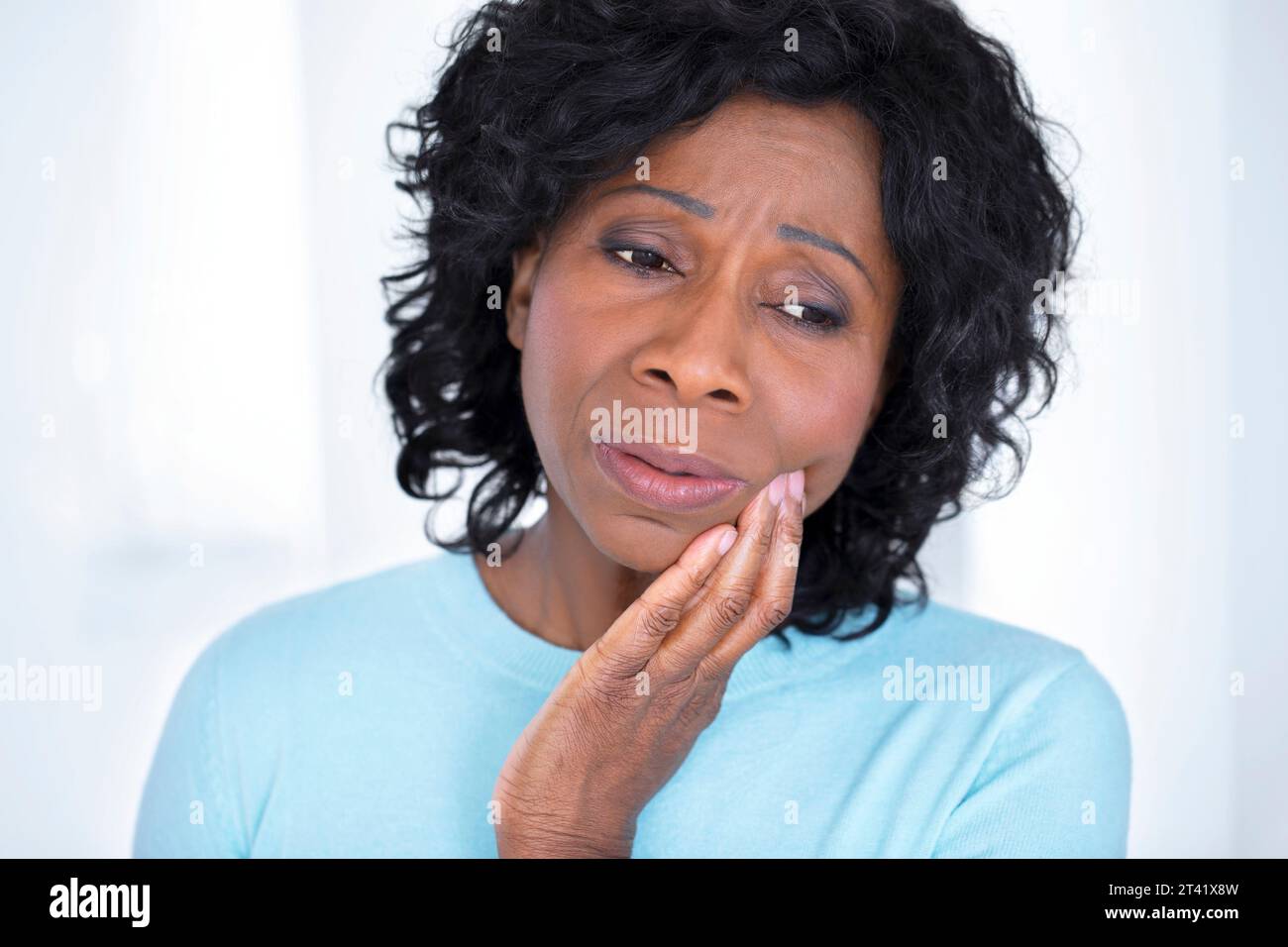 Woman with toothache Stock Photo - Alamy