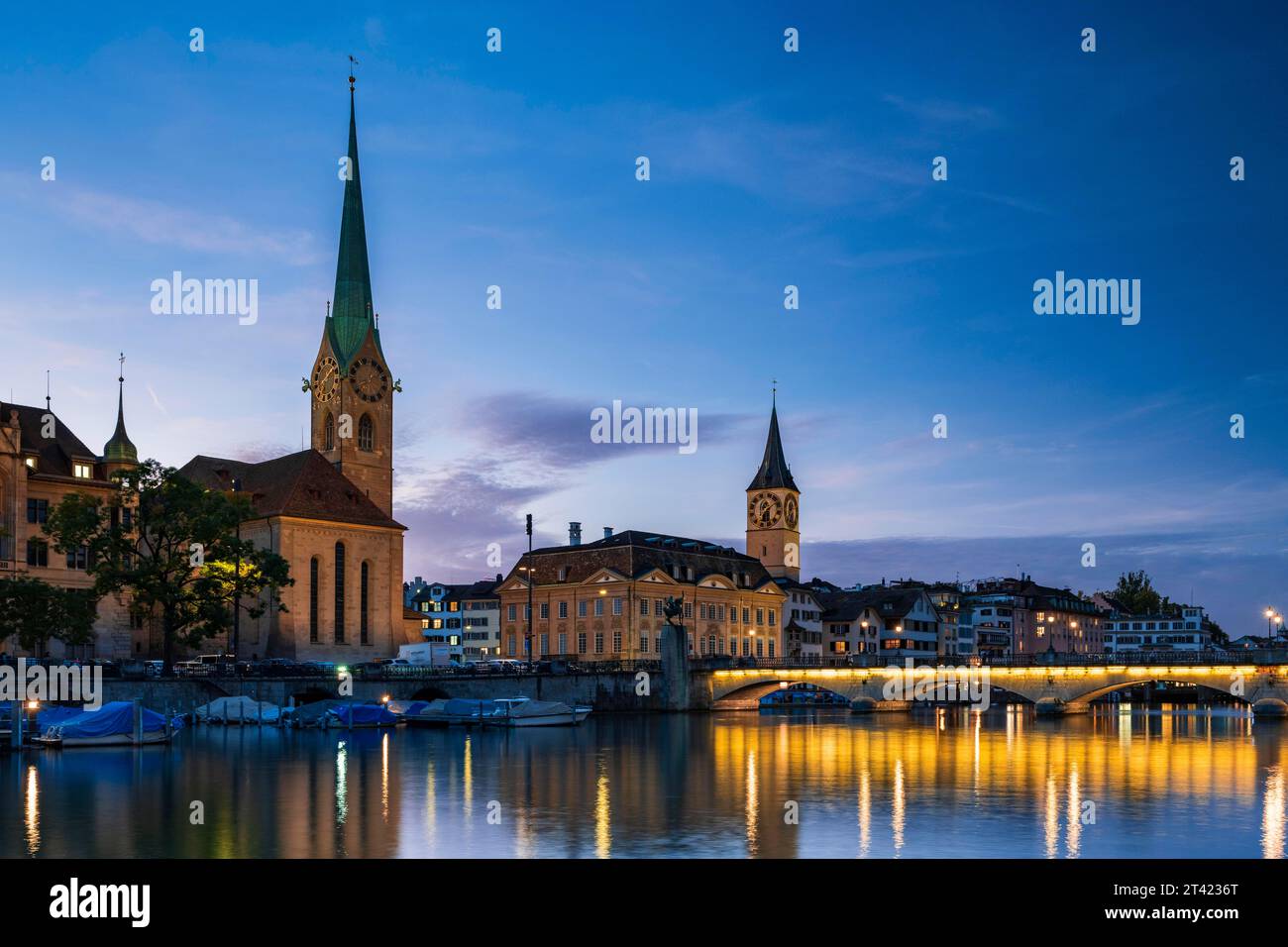 Fraumuenster and St. Peter's Church at dusk, River Limmat, Old Town of Zurich, Canton Zurich, Switzerland Stock Photo