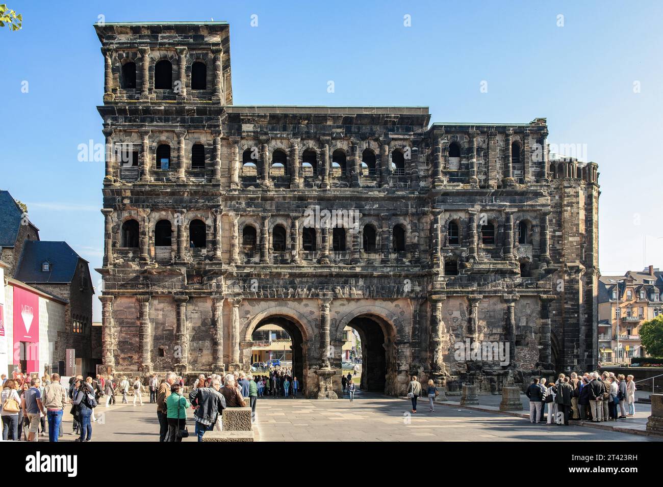 Perspective corrected photo of city side view looking at historic ancient Roman city gate Porta Nigra in Trier, Trier, Rhineland-Palatinate, Germany Stock Photo