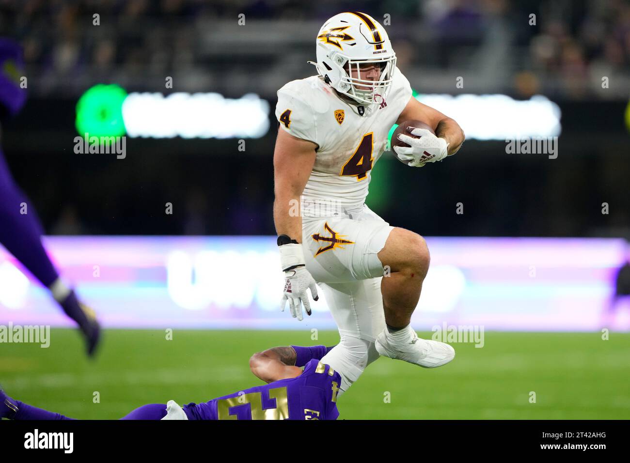 Arizona State running back Cameron Skattebo (4) runs with the ball