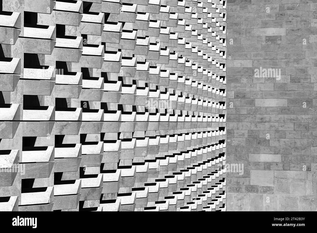 A mosaic of square tiles and brickwork creating an interesting ...