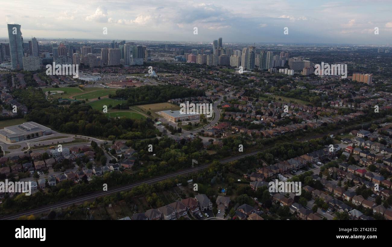 Aerial view of a residential neighborhood with rows of houses, trees ...