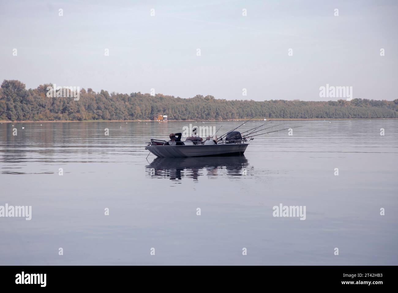 Two men fishing in a boat hi-res stock photography and images - Alamy