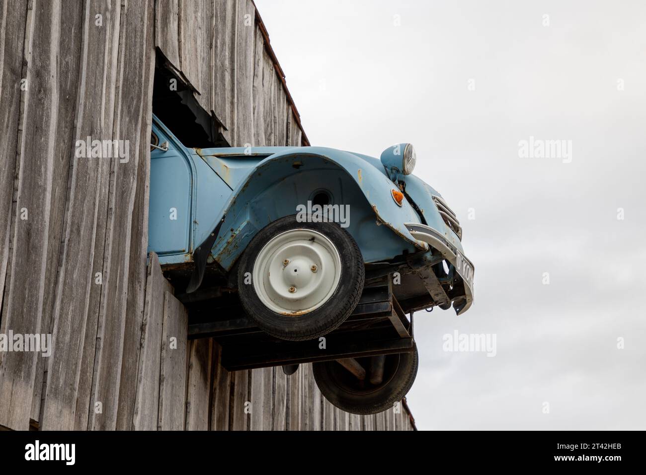 Bordeaux , France - 10 19 2023 : citroen 2cv in store facade wall entrance shop decoration car old vintage collector french historical vehicle Stock Photo