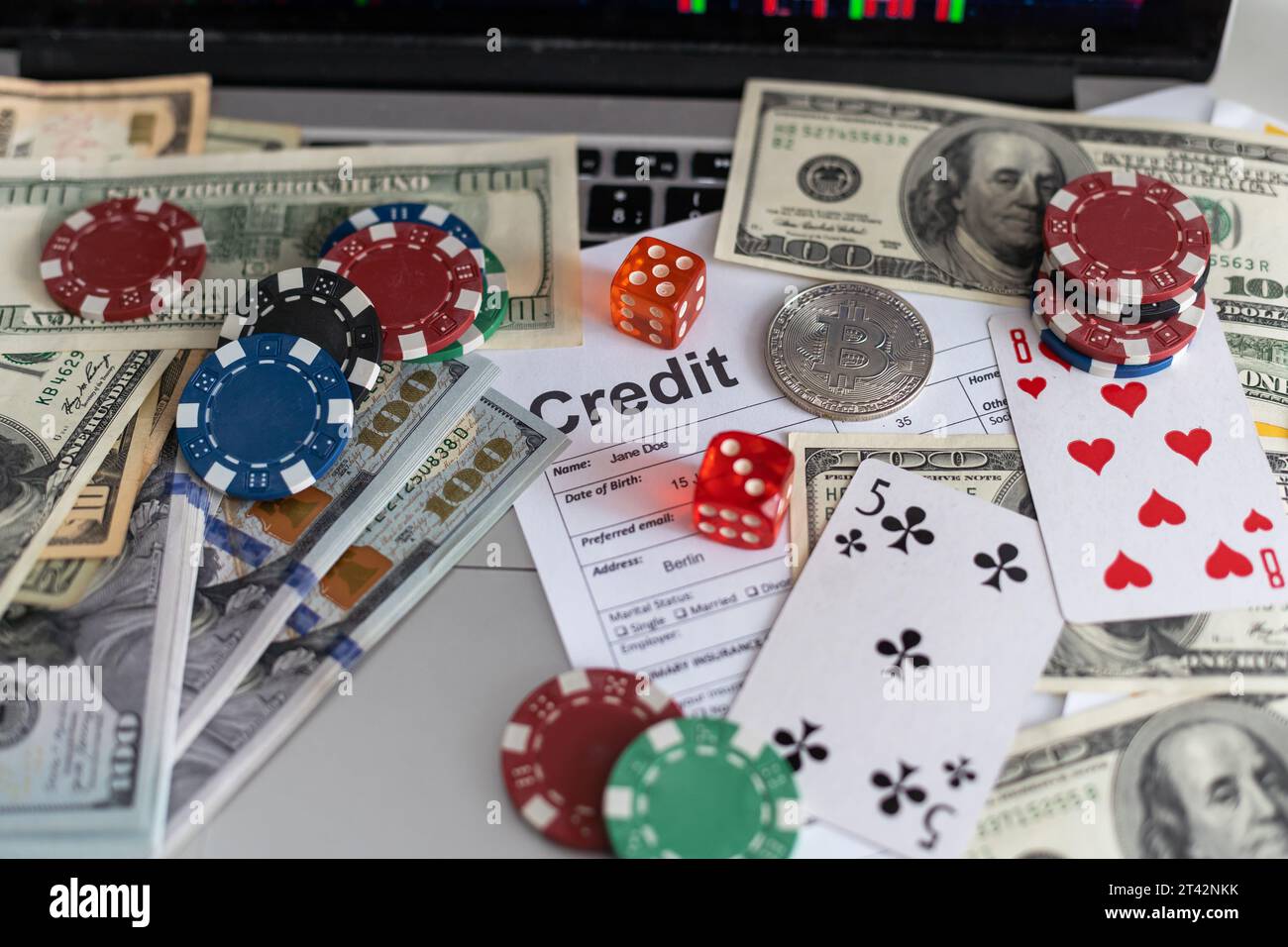 Golden bitcoin coins and poker cards representing online gambling and  digital finance Stock Photo - Alamy
