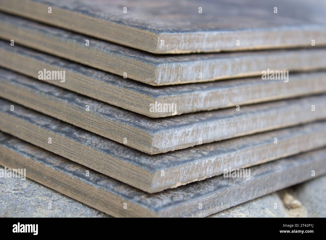 A pile of composite ceramic tiles for stairs Stock Photo