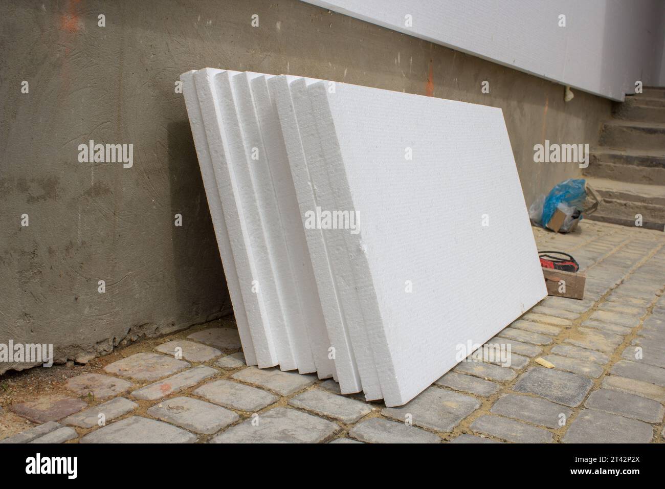 styrofoam sheets stacked to the wall for repair and insulation of the