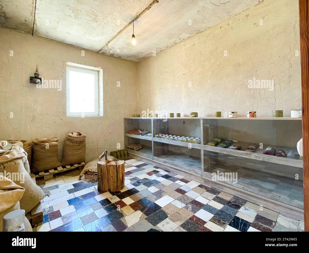 Shelves and sacks in a food warehouse room. In a recreation of an Armenian bunker complex at the Military Trophy Park, commemorating the 2020 Nagorno- Stock Photo