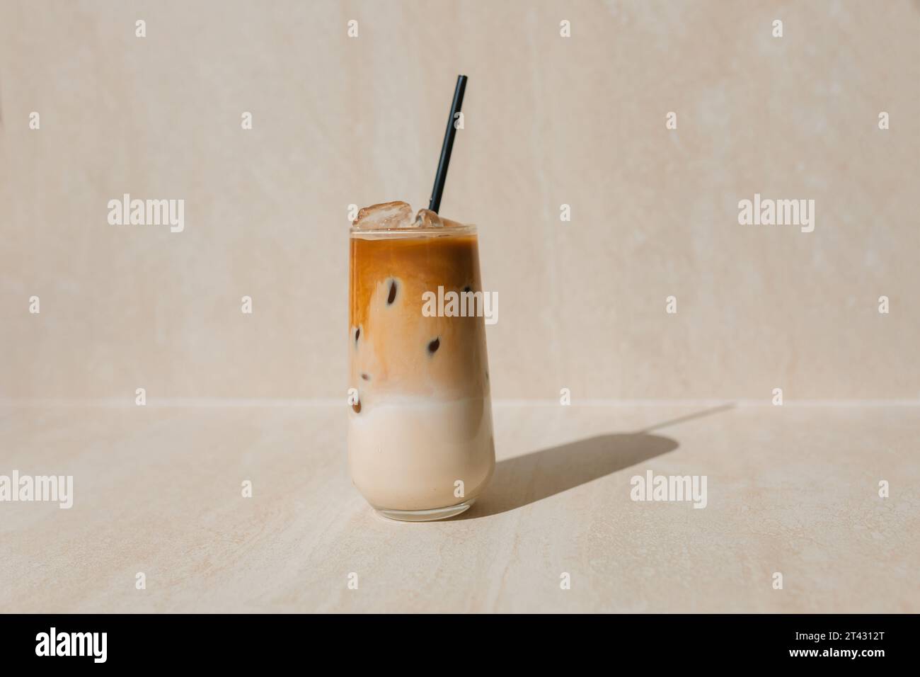 Iced coffee in jar, mug glass cup on the white table Stock Photo - Alamy