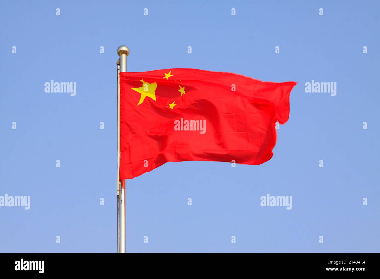 flag of the Republic of China, waving in the blue sky. Stock Photo
