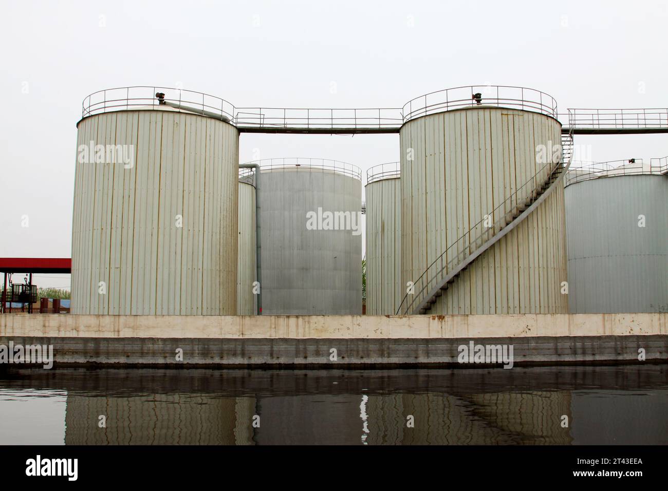 Storage tanks in a production enterprise, closeup of photo Stock Photo ...