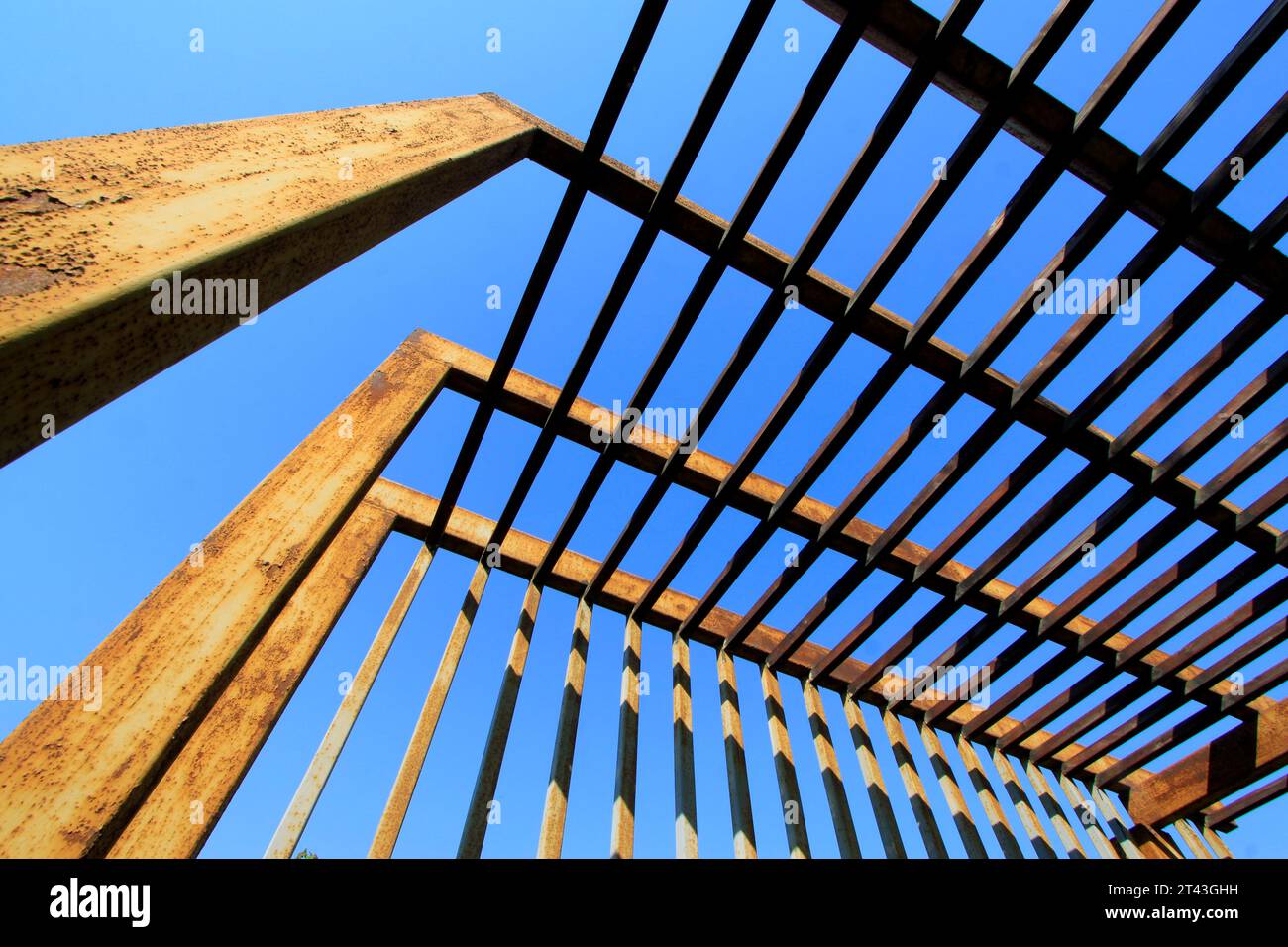 Oxidation rust steel beams in blue sky background, closeup of photo ...