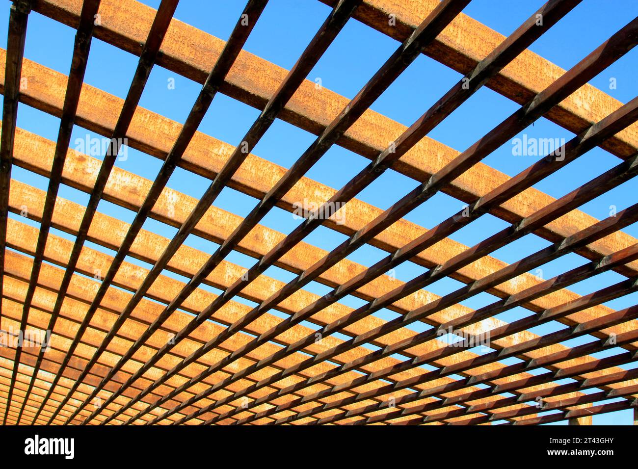 Oxidation rust steel beams in blue sky background, closeup of photo ...