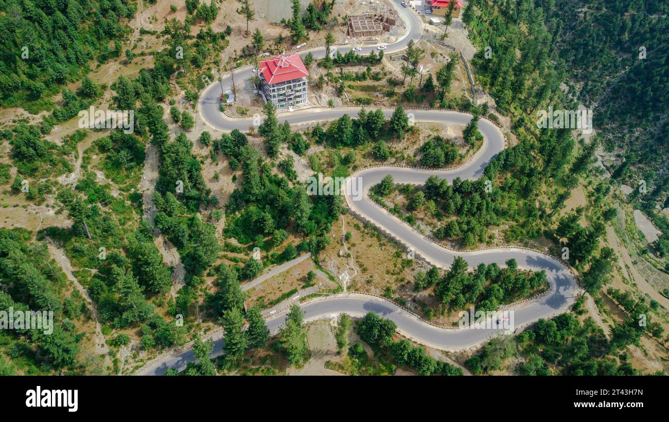 Embracing the twists and turns of life on the mesmerizing zigzag roads of Swat Valley, Stock Photo