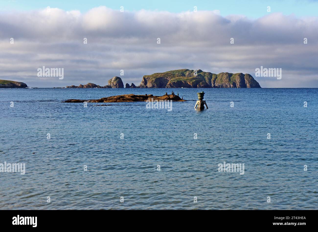 A view of the Time and Tide Bell installed in the tidal Bosta Beach on Great Bernera in the Isle of Lewis in the Outer Hebrides, Scotland. Stock Photo