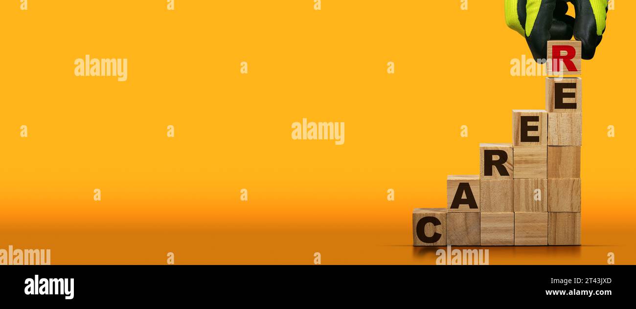 Gloved hand arranging wood blocks with text Career, on a yellow and ...