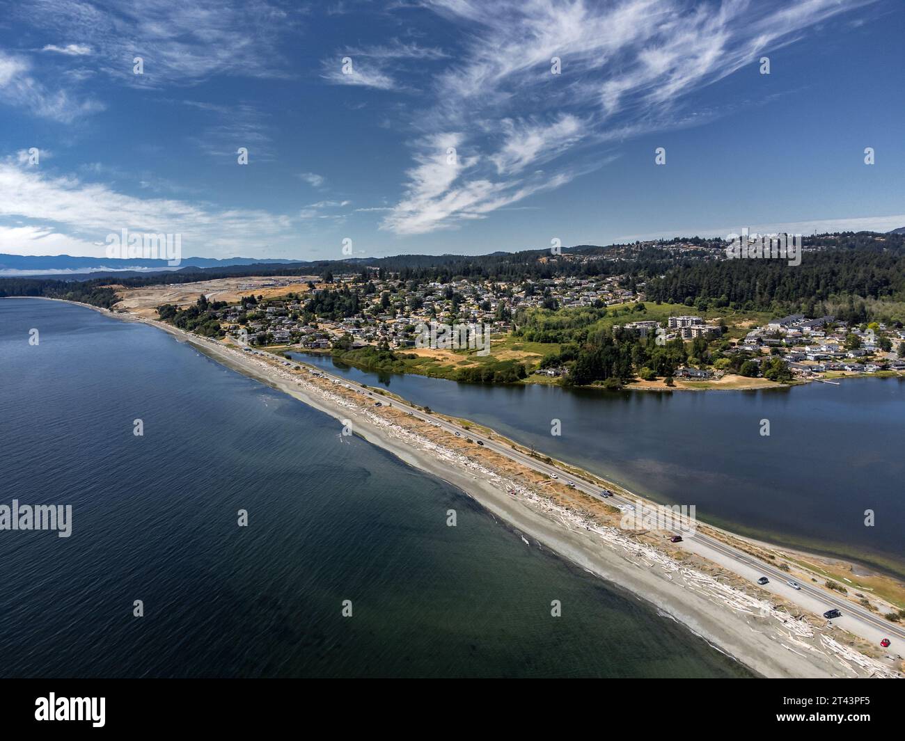 Esquimalt lagoon aerial looking towards Royal bay new development and the Olympic Mountains in Washington USA on Vancouver Island Canada. Stock Photo