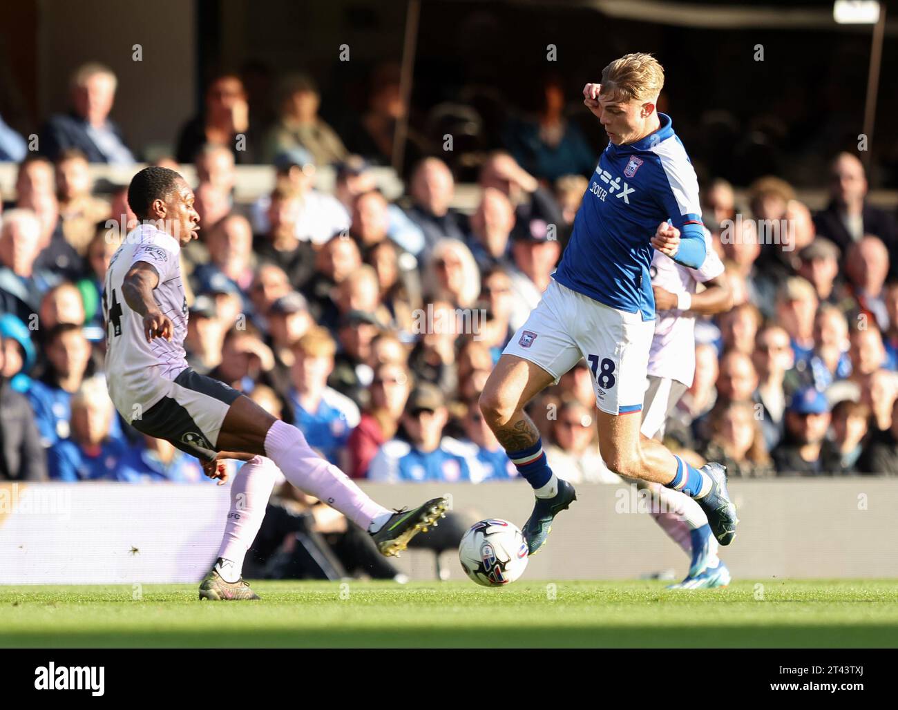 Ipswich Town's Brandon Williams in action against Plymouth Argyle's Mickel Miller during the Sky Bet Championship match at Portman Road, Ipswich. Picture date: Saturday October 28, 2023. Stock Photo