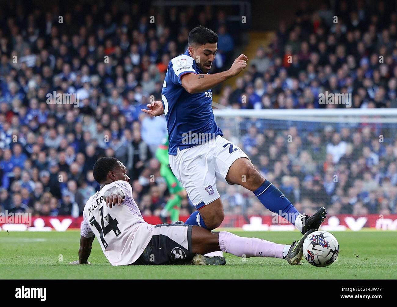 Ipswich Town's Massimo Luongo is tackled by Plymouth Argyle's Mickel Miller during the Sky Bet Championship match at Portman Road, Ipswich. Picture date: Saturday October 28, 2023. Stock Photo