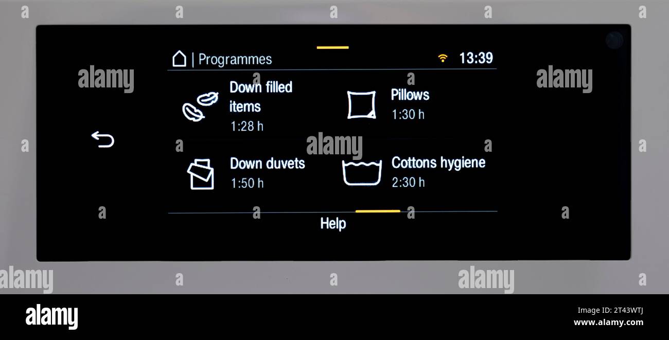 Washing cycle selections on a Miele washing machine. Stock Photo