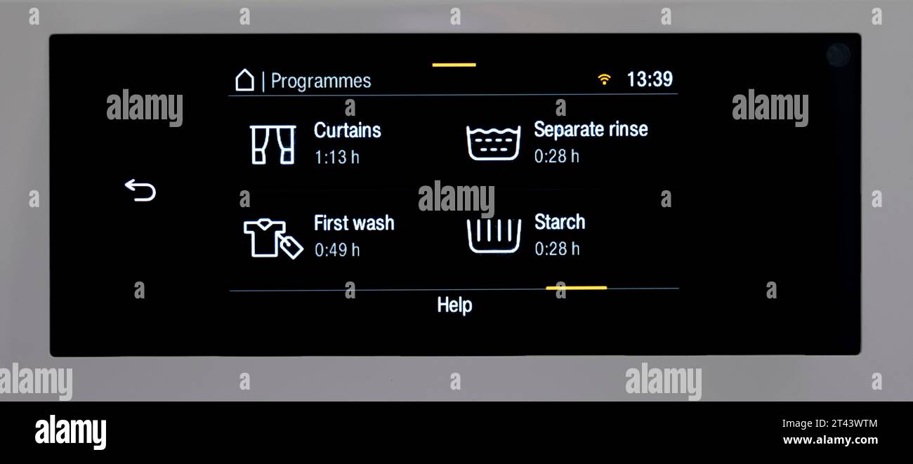 Washing cycle selections on a Miele washing machine. Stock Photo