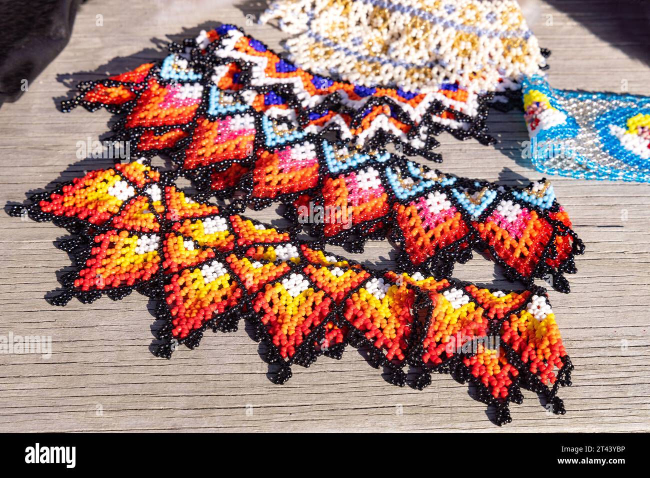 Colourful traditional Inuit jewellery and craft for sale at a market stall Qaqortoq Greenland Arctic. Greenland tourism Stock Photo Alamy