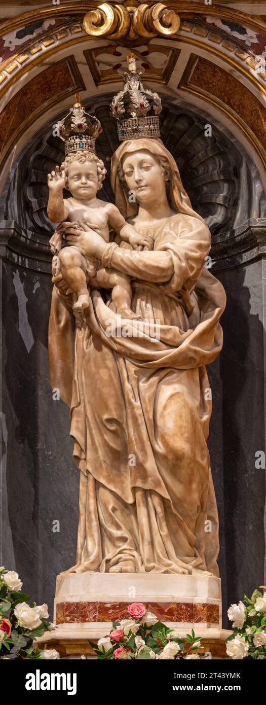 GENOVA, ITALY - MARCH 5, 2023: The marble statue of Madonna in church Basilica di Santa Maria delle Vigne by  Giovanni Battista and Tommaso Orsolino Stock Photo