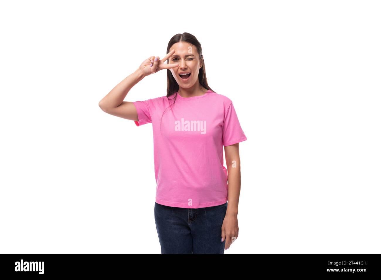 Woman wearing pink top jeans hi-res stock photography and images - Alamy